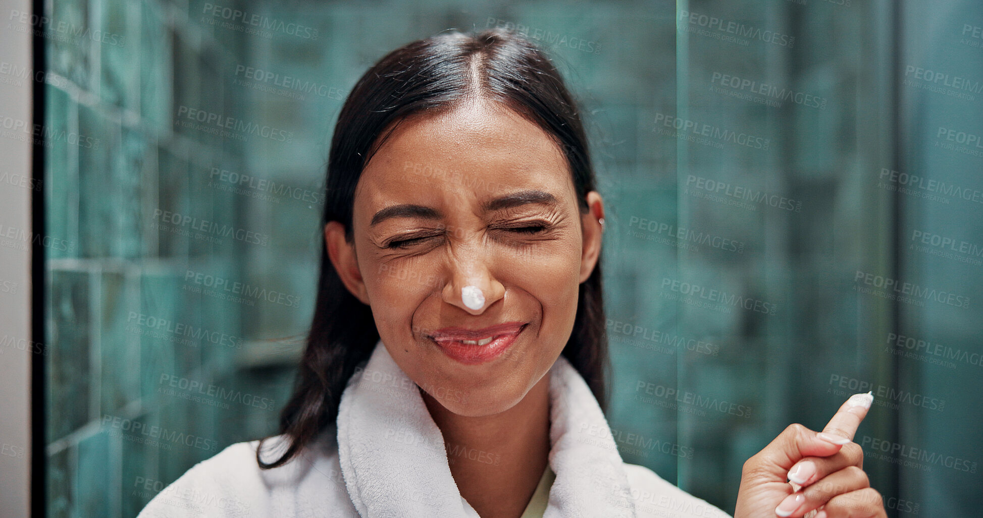 Buy stock photo Face cream, goofy and woman in bathroom with skincare, natural or moisturizer for wellness. Playful, facial lotion and female person with dermatology routine in morning for hygiene in apartment.