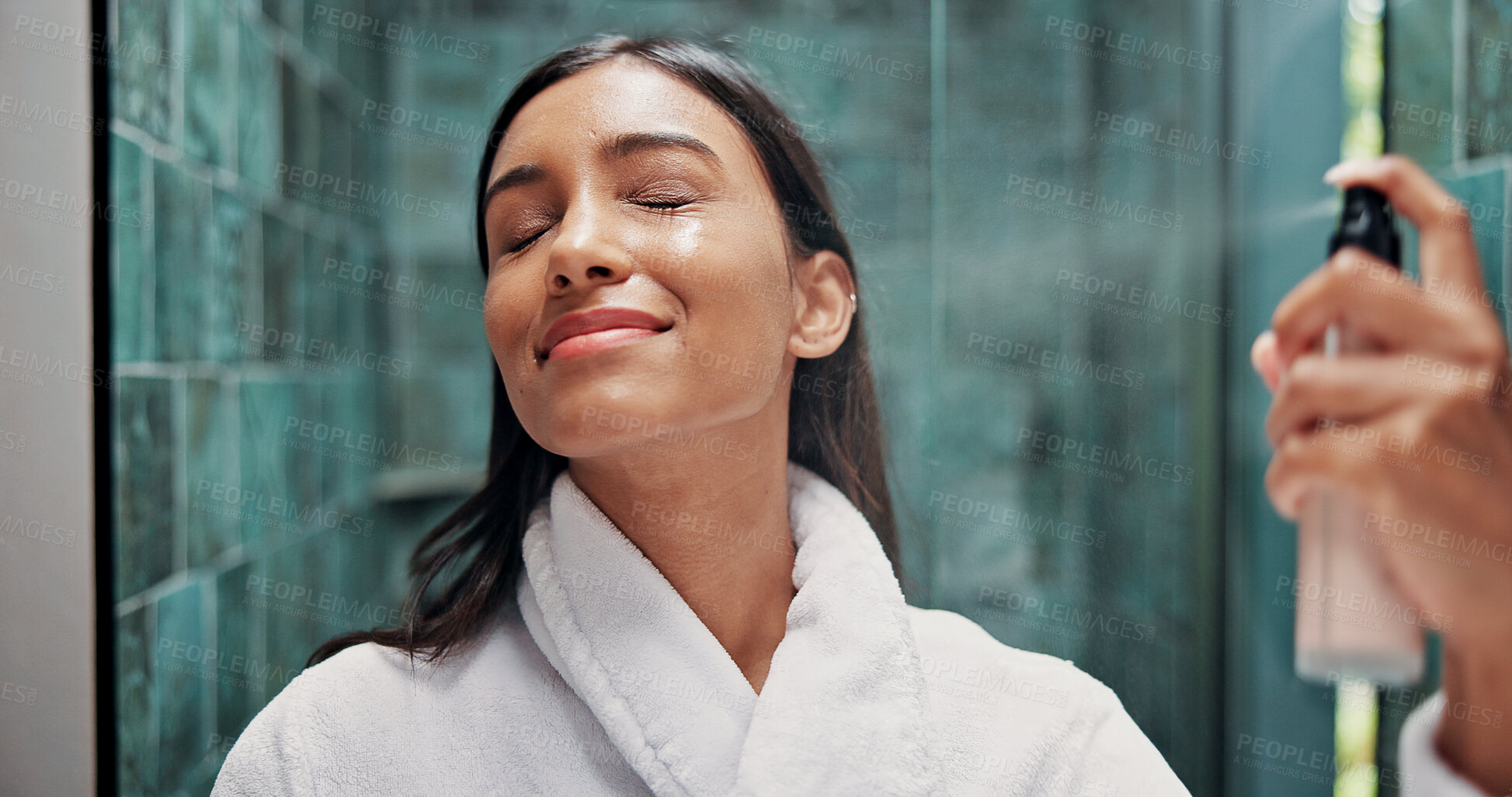 Buy stock photo Woman, skincare and spray with face mist in bathroom for hydration, dermatology or beauty cosmetic. Female person, and wellness in home with facial product, glowing skin and hyaluronic acid benefits.