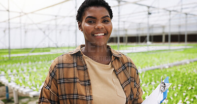 Buy stock photo Happy, black woman and portrait with greenhouse for agriculture, plant production or natural growth. Female person, farmer or smile with clipboard for organic food, farming crops or sustainability