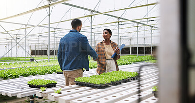 Buy stock photo Farm, handshake and people with plants in greenhouse for growth, produce and sustainable business. Agriculture, teamwork and farmer with person shaking hands for organic crops, harvest and vegetables