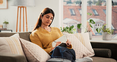 Buy stock photo Woman, relax and writing on sofa with diary for planning goals, creative idea or process emotions. Daily reflection, notes or person in home with journal for self improvement, inspiration or insight.