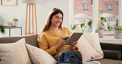 Buy stock photo Tea, reading book and woman in home for funny story, fantasy and morning beverage. Coffee, literature and happy person on sofa in living room with drink, laughing and hobby for relax on weekend break