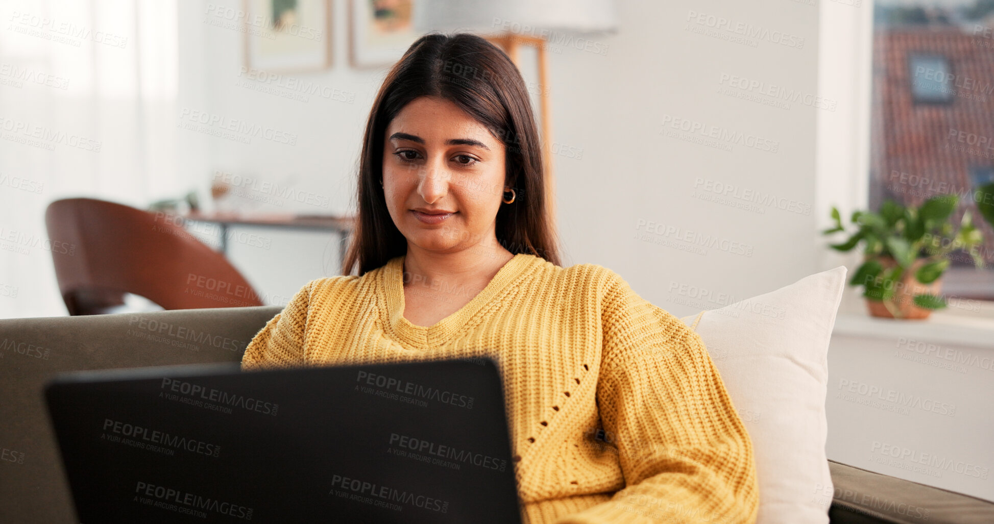 Buy stock photo Woman, typing or research in home with laptop for job vacancy, employment and hiring opportunity. Person, browsing and search with computer on sofa for email, work application and career development.