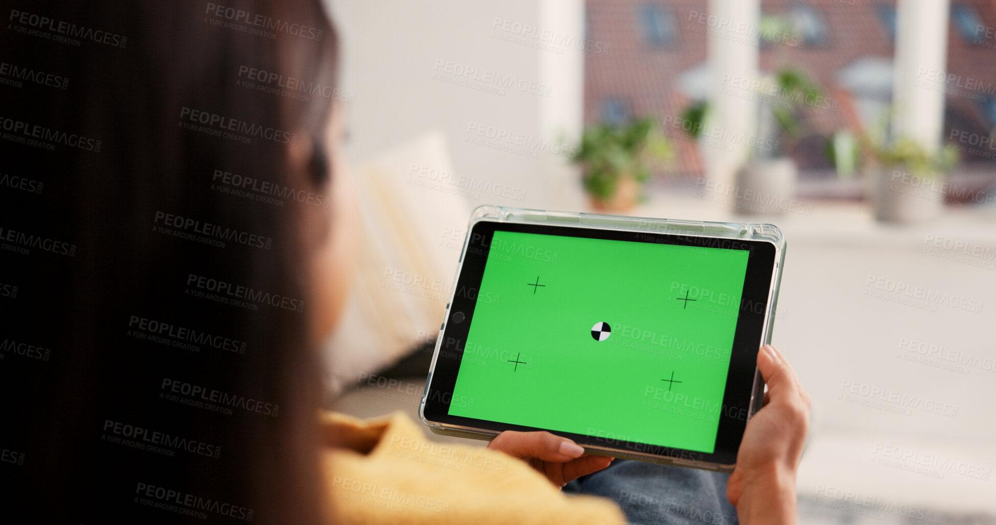 Buy stock photo Woman, hands or tablet with green screen in home for advertising, research or marketing app. Back view, female person or user with technology display for online entertainment on mockup space in house