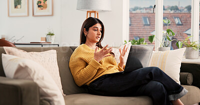 Buy stock photo Laptop, video call and woman on sofa in home with communication, freelance or online meeting. Computer, remote work and female person on virtual discussion with tech in living room at apartment.