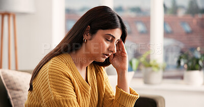 Buy stock photo Stress, pressure or Indian woman in home with headache, frustration or mistake in living room. Mental health, emotional or female person on sofa with migraine, overwhelmed or anxiety with thoughts.