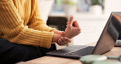 Buy stock photo Hands, woman and laptop with wrist pain in home from poor ergonomics, article editing or remote work. Freelancer, journalist or tech with muscle tension in house from publication burnout or arthritis