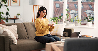 Buy stock photo Pills, health and woman on sofa in home with prescription drugs, supplements and vitamins. Apartment, morning and person with tablets, medication and medicine for wellness, treatment and recovery