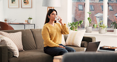 Buy stock photo Thirsty, woman and drinking water with glass at house for hydration, refreshing liquid and detox. Female person, relax and cold beverage for nutrition, digestion benefits and minerals for gut health