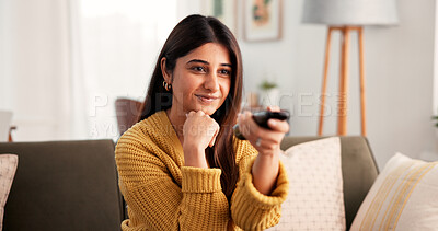 Buy stock photo Happy, woman and watching tv with remote, lounge and program change on website, relax and streaming. Indian person, smile and controller for channel, chill and entertainment with subscription in home