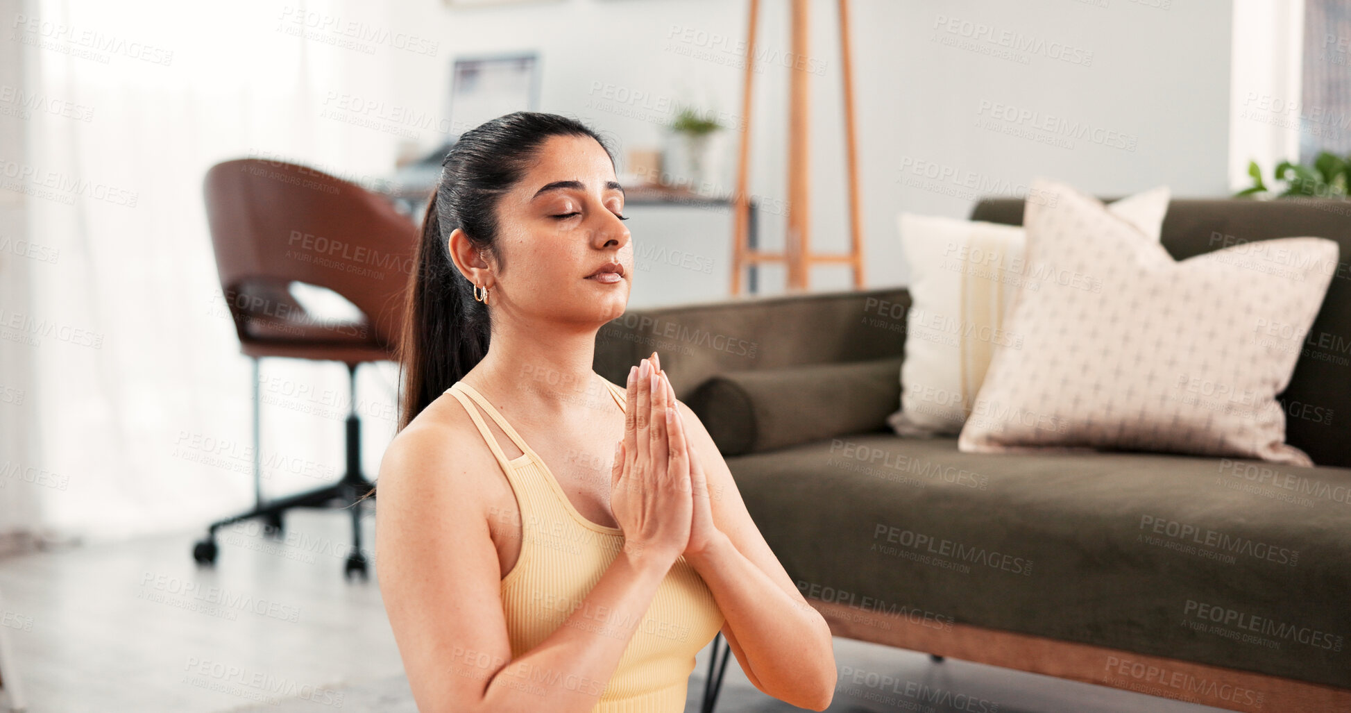 Buy stock photo Yoga, meditation and home with woman, hands together and calm with wellness, chakra and zen. Apartment, yogi or healthy person on floor, inner peace or stress relief with fitness or pilates in lounge