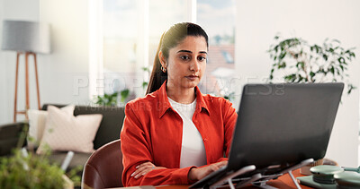 Buy stock photo Typing, laptop and freelancer with woman in home office for research, blog writer and copywriting project. Remote worker, article editor and online review with person in living room of apartment