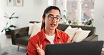 Laptop, remote work and video call with woman in home living room for discussion or planning. Computer, conversation and virtual meeting with freelance employee in apartment for contact or update