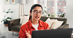 Laptop, remote work and video call with woman in home living room for discussion or planning. Computer, conversation and virtual meeting with freelance employee in apartment for contact or update