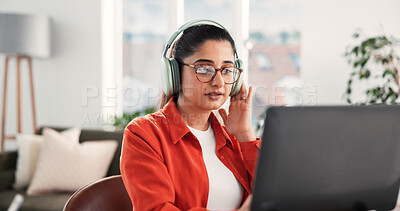 Buy stock photo Headphones, remote work and business woman on laptop for planning, online copywriting and research. Freelance, home and person on computer with music, streaming audio and podcast for editing article