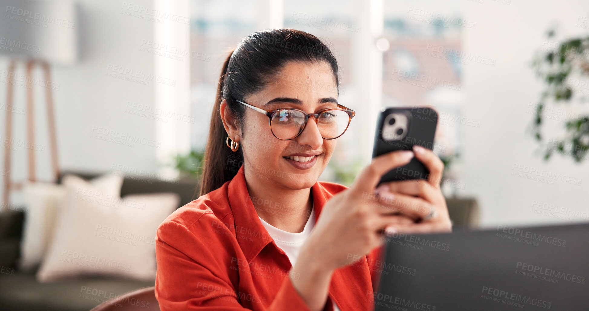 Buy stock photo Phone, reading and smile with woman in home office for social media manager, contact and freelancer. Remote worker, communication and branding entrepreneur with person in house for research and app