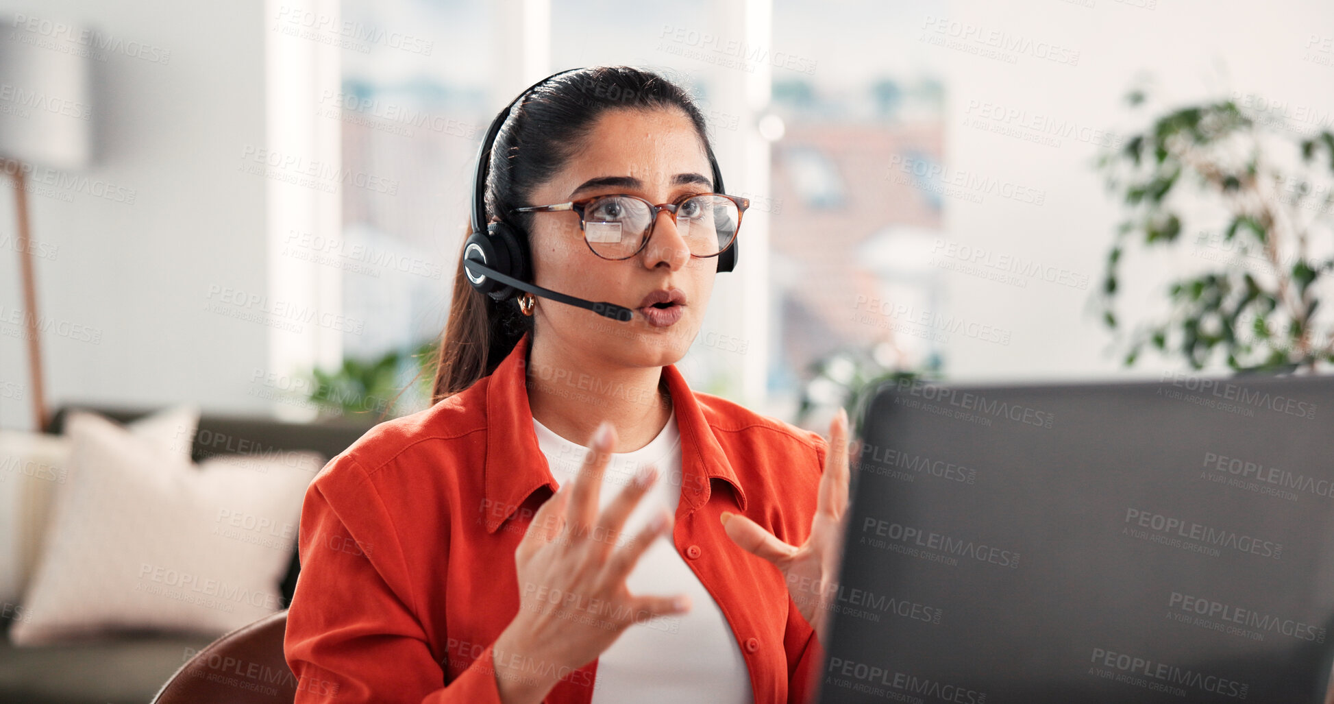 Buy stock photo Headset, laptop and video call with woman in home living room for discussion or planning. Computer, remote work and virtual meeting with Indian freelancer in apartment for contact, explain or update