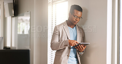 Buy stock photo Media agency, tablet and black man in office, typing and copywriting with online reading. Person, connection or journalist with tech, magazine website or email for submission, internet or publication