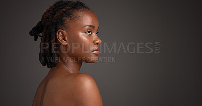 Buy stock photo Skincare, serious and black woman in studio with space for natural, wellness and facial glow. Beauty, thinking and African person with dermatology for health, hydration or cosmetic by gray background