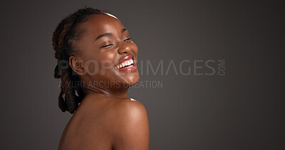 Buy stock photo Skincare, happy and black woman in studio with space for natural, wellness and facial glow. Smile, beauty and African person with dermatology for health, hydration or cosmetics by gray background.