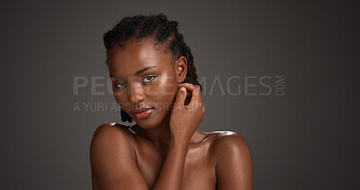 Buy stock photo Skincare, studio and woman with glow, portrait and natural cosmetics for healthy skin and self care. Gray background,  black person and shine with dermatology, confident and wellness in Nigeria