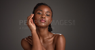 Buy stock photo Hands, skincare and portrait of black woman in studio for hydration, self care or dermatology. Mockup, dark background and person with natural beauty, wellness and aesthetic for glow, shine or health