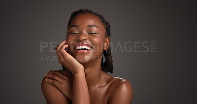 Buy stock photo Beauty, happy and woman with skincare in studio for natural glow, hydration or healthy skin. Mockup space, black girl or smile on gray background for collagen treatment results and self care radiance