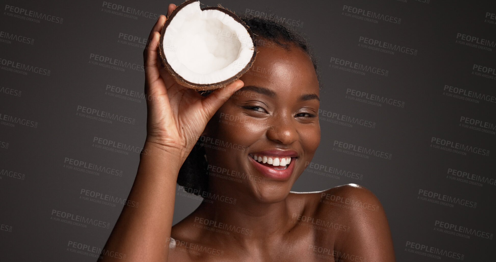 Buy stock photo Skincare, coconut and portrait of black woman in studio with natural, health and organic facial glow. Happy, space and African person with fruit for face hydration with dermatology by gray background