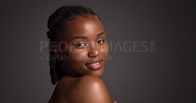 Buy stock photo Portrait, confident and woman with smile, skincare and natural cosmetics for healthy skin and beauty. Gray background, happy black person and shine with dermatology, mockup space or studio in Nigeria