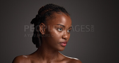 Buy stock photo Black woman, beauty or thinking of skincare in studio, wellness shine or healthy glow for facial cosmetic. Self care, mockup space or person with dermatology, idea or flawless skin on gray background