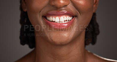 Buy stock photo Dental, closeup or black woman in studio with smile, mouth or tooth wellness in orthodontics. Lips, happiness and female person on gray background with hygiene, whitening or dentistry in oral health