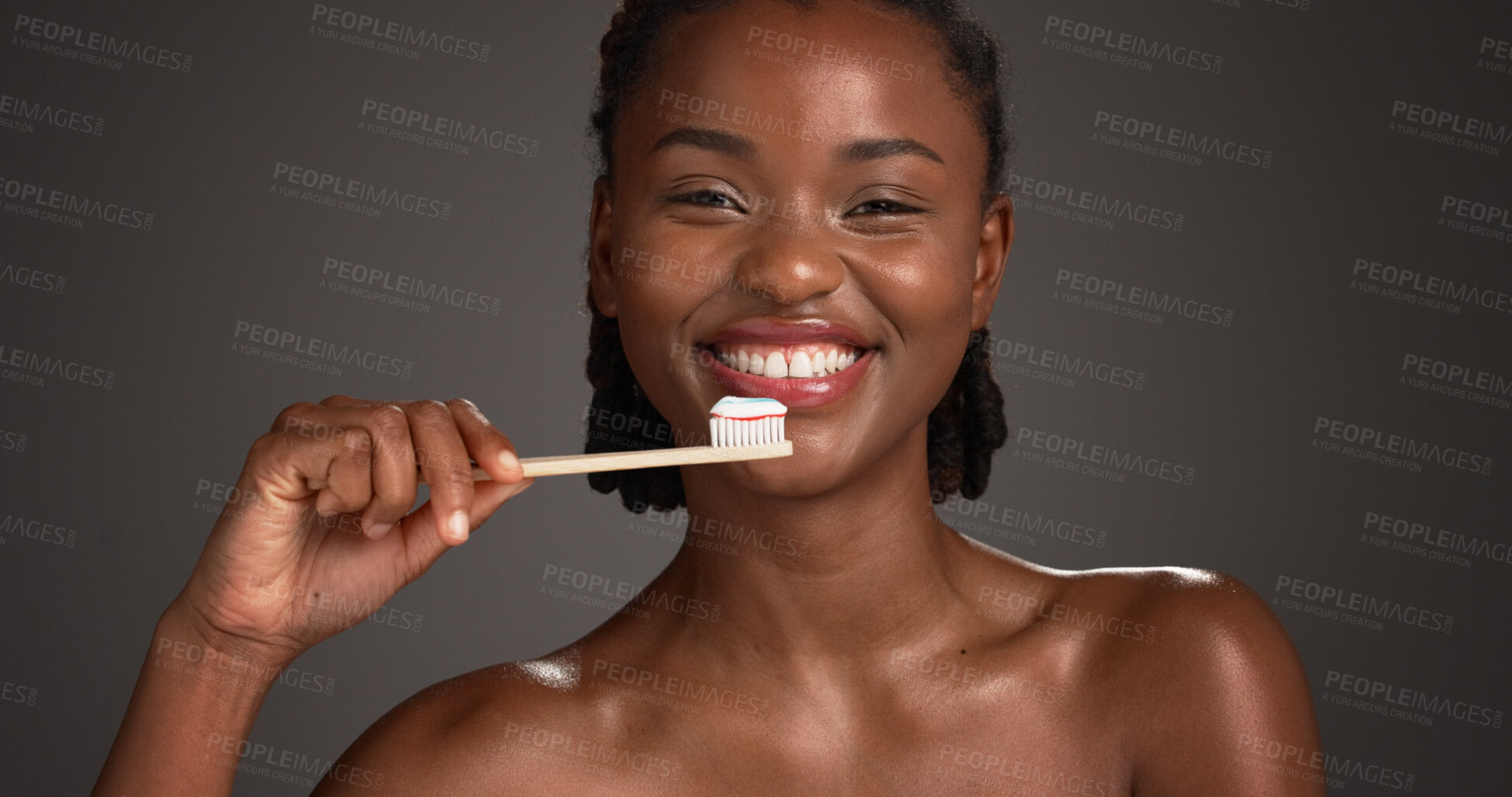 Buy stock photo Black woman, portrait or dental care with toothbrush in studio for hygiene on a gray background. Female person, model or smile with paste or bamboo stick for cleaning teeth or eco friendly gum health