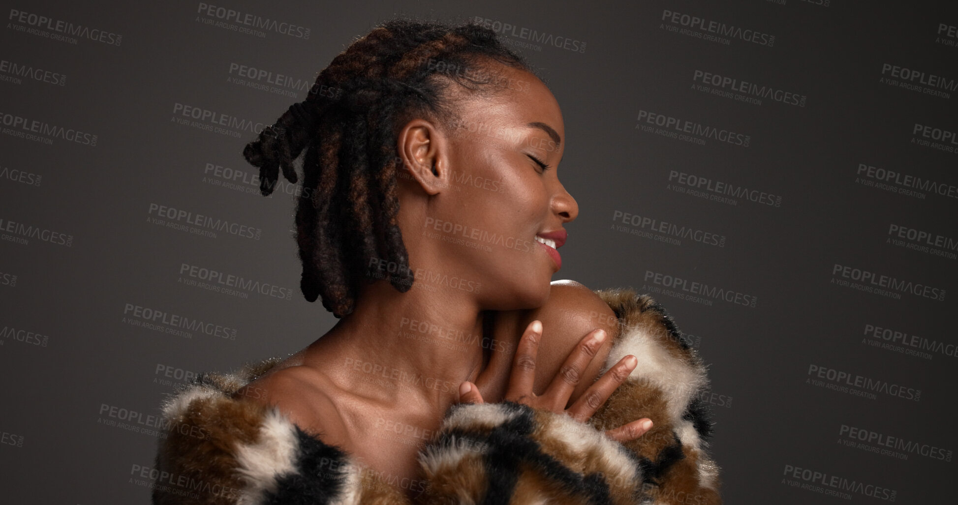 Buy stock photo Proud, black woman and makeup for beauty in studio with cosmetics, facial glow and aesthetic. Space, female person and wellness with luxury shine, fur coat and glamour for makeover on gray background