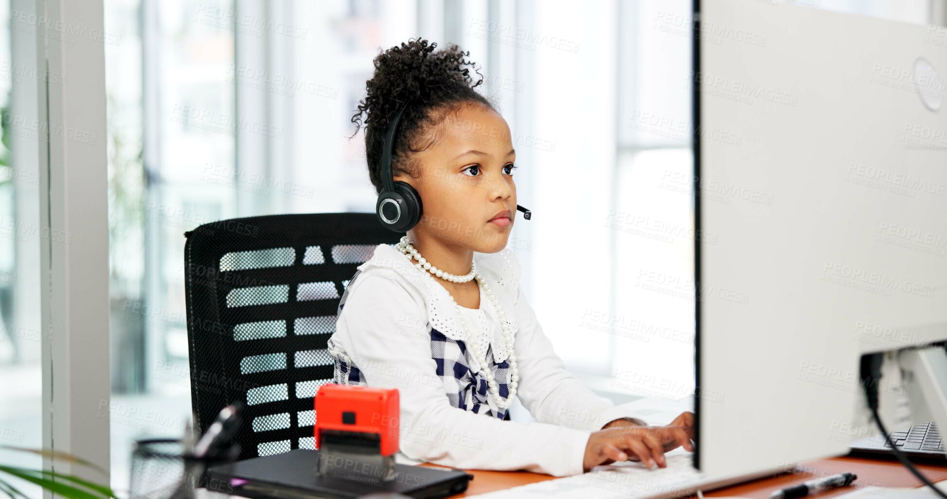 Buy stock photo Typing, computer or child with headset in office, business professional cosplay or customer care career. Pc, tech support dressup or girl with virtual assistant costume, hotline agent and call center