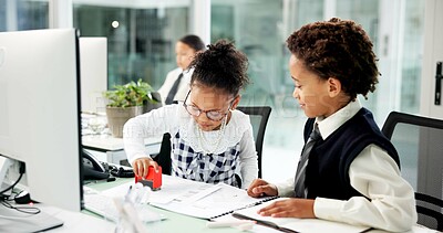 Buy stock photo Business, collaboration and stamp with children in coworking office together for cosplay. Approval, documents or pretend with boy and girl employee at desk in workplace for costume or dress up