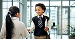 Happy children, business and playing with handshake in office for junior partnership or cosplay. Girl, boy or kids shaking hands with smile for career day, team agreement or pretending in workplace