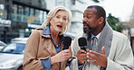 Talking, microphone and journalists with interview in city, breaking news or story. Mature people, reporter or interviewer outdoor for live broadcast, announcement or information update with portrait