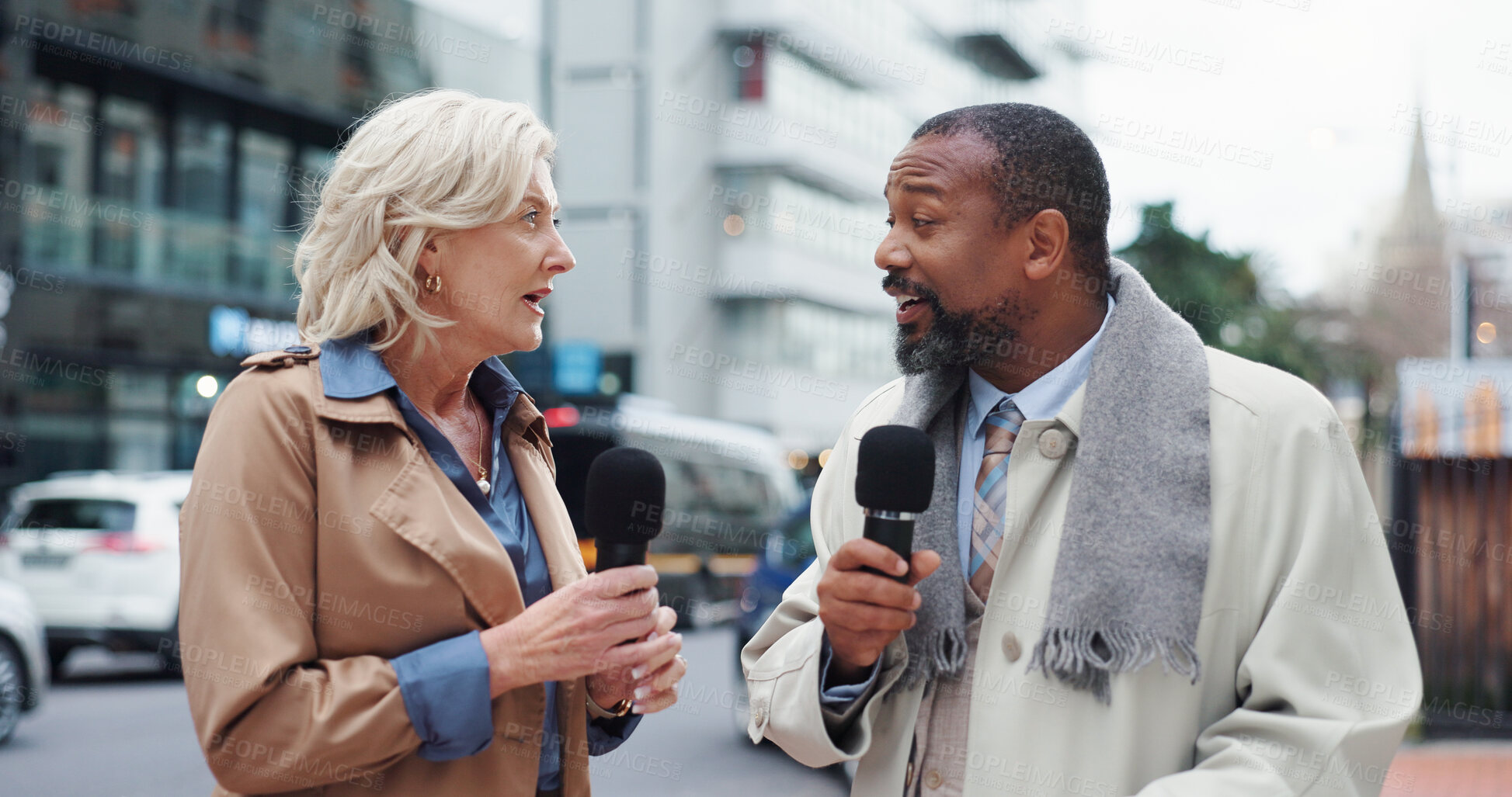 Buy stock photo Talking, microphone and reporters with interview in city, breaking news or story. Mature people, journalist or interviewer outdoor for live broadcast, announcement or information update on street