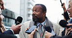 Man, politician and talking to press, city and journalists with election questions and conversation. Outdoor, interview and minister with reporters for campaign update, discussion and people with mic