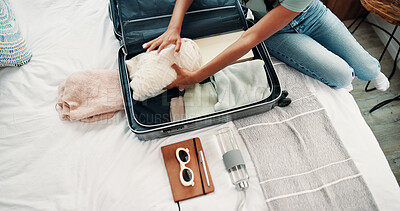 Buy stock photo Hands, luggage and packing with person in bedroom of home for holiday, travel or vacation. Above, getting ready and suitcase with tourist or traveler on bed in apartment for trip preparation