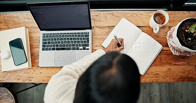Buy stock photo Above, woman or writing in home for remote work, HR support or daily administration with laptop. Person, diary or agenda note in house with planner for task priority, calendar management or planning.