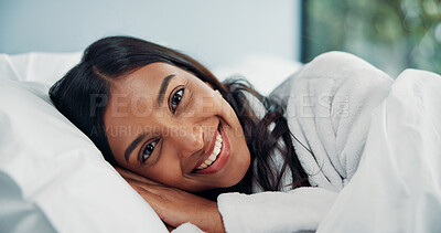 Buy stock photo Break, portrait and smile of woman in bed for comfort, cozy or wellness on lazy weekend morning. Awake, relax and travel with happy Indian person in hotel bedroom for accommodation or hospitality