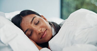 Buy stock photo Blanket, relax and sleeping with woman in bed of hotel for comfort, peaceful nap or resting. Asleep, break and tired with Indian person in bedroom for accommodation, hospitality or lazy weekend