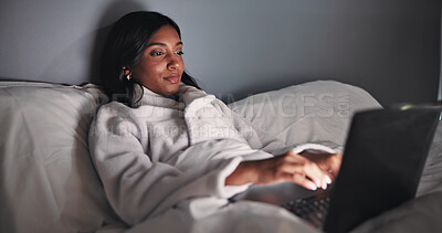 Buy stock photo Woman, typing and laptop in bed at night for research, editing story and article submission. Person, remote work and pc for writing headline, breaking news coverage and publication deadline at house
