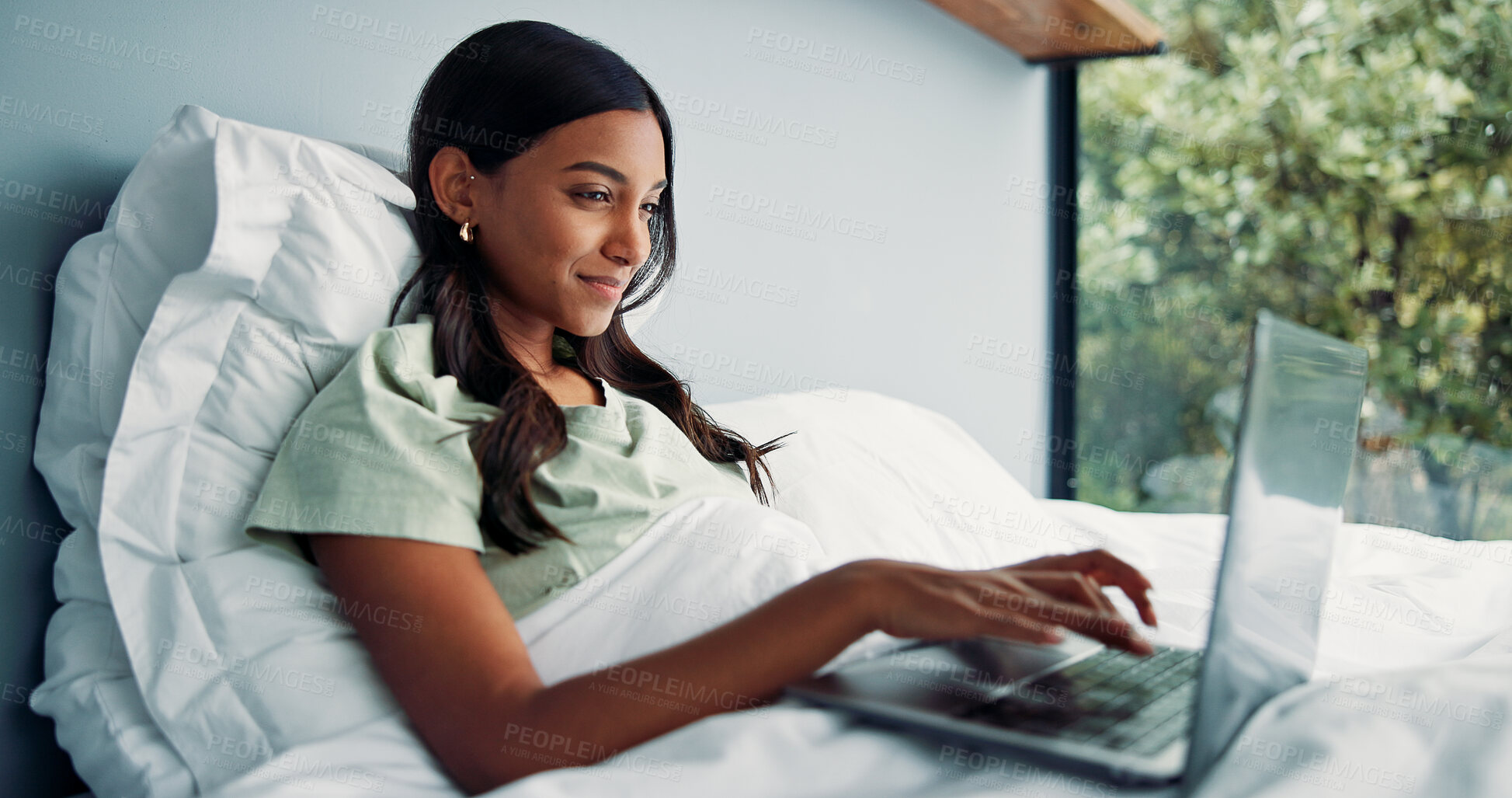 Buy stock photo Woman, editing or remote work in bed with laptop for journalism, news or story publication in hotel. Digital nomad, person and typing in lodge with computer for proofreading article, blog and report.