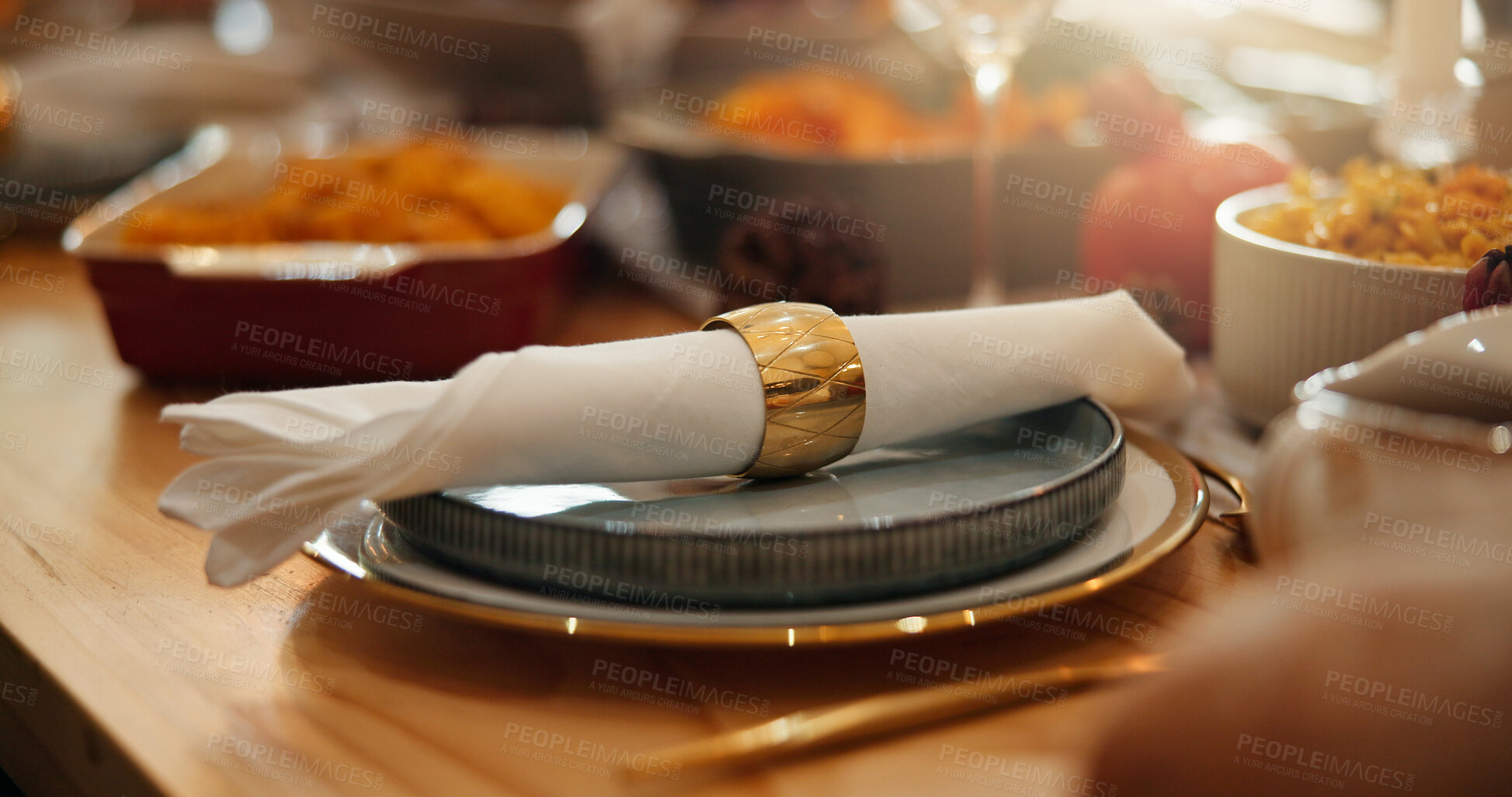 Buy stock photo Christmas, feast and napkin with place setting on dining room table for social gathering. Banquet, celebration event and ring on serviette in home for decoration, meal or party in holiday season