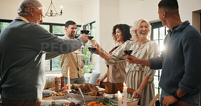 Buy stock photo Christmas, toast and group with wine, home and family with meal in dining room, feast or celebration. Xmas, cheers and people with alcohol for December holiday, gathering and party for festive season