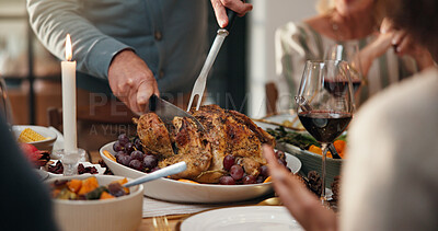 Buy stock photo Thanksgiving, turkey and hands of person in dining room for holiday season, family gathering or tradition. Festive feast, party and roast chicken with people in home for food, hosting and hospitality