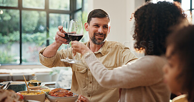 Buy stock photo Christmas, toast and parents with wine, home or happy with meal in dining room, love and celebration. Xmas, cheers and people with alcohol for December holiday, gathering and party for festive season