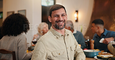 Buy stock photo Thanksgiving, portrait and smile with man in dining room for holiday season, dinner or tradition. Festive feast, party and event with people eating in home for food, hosting and hospitality together